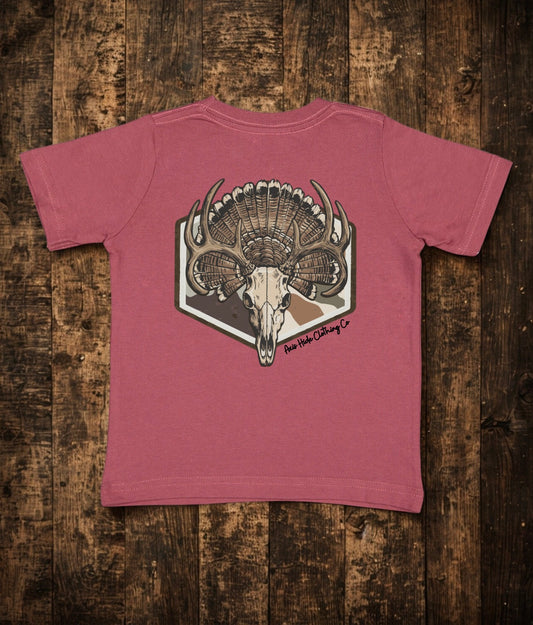 Buck skull & turkey feathers